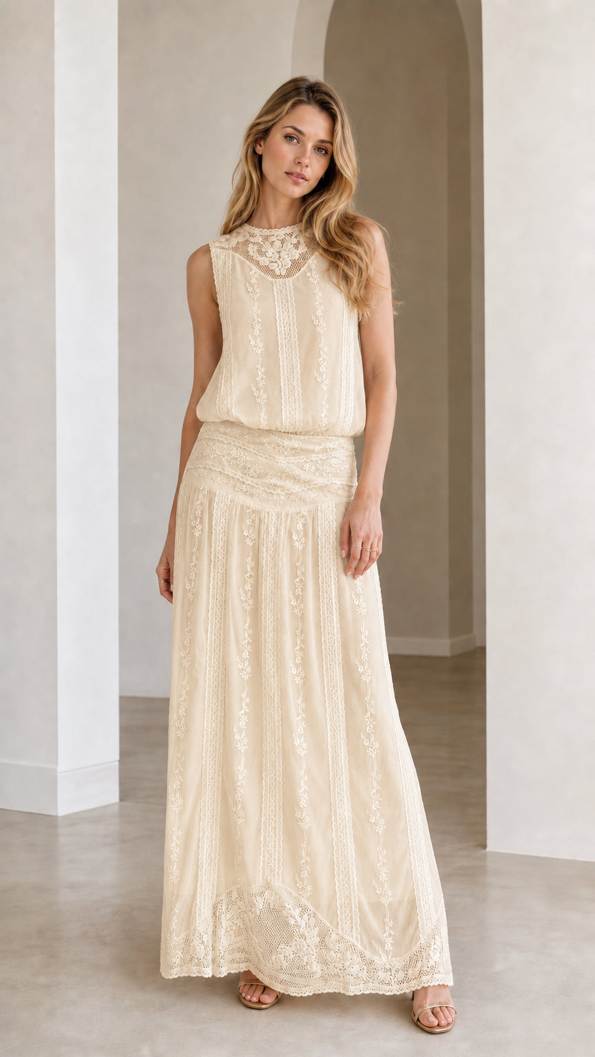 Woman wearing champagne embroidered maxi dress