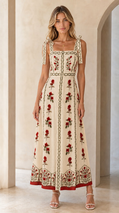 Woman wearing beige variant of the floral embroidered maxi dress
