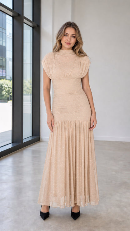 Model wearing champagne glitter mesh maxi dress