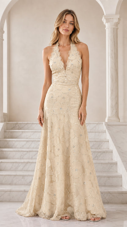 Front view of champagne cream floral embroidered halter formal maxi dress