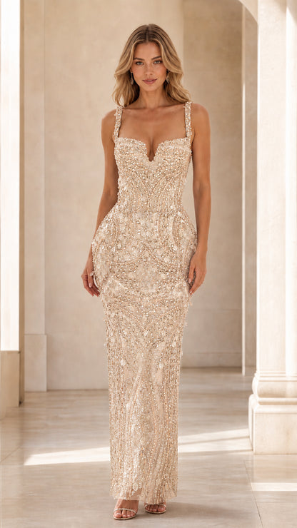 Model wearing champagne metallic sequin formal dress