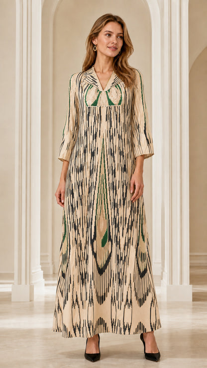 Front full-length view of woman wearing Cream Ikat Print Embellished Maxi Dress
