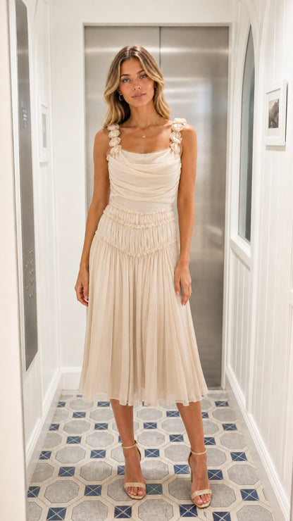 Front view of woman wearing champagne ruched chiffon midi dress