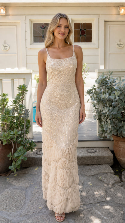 Full-length front view of champagne gold sequin and beaded evening gown