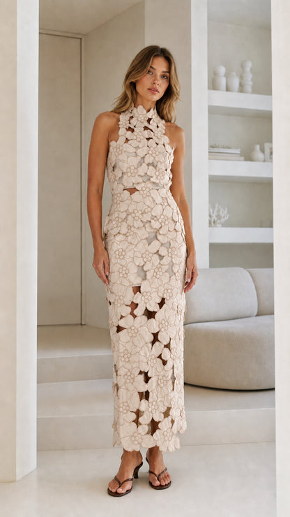 Front view of Beige floral laser-cut halter midi dress
