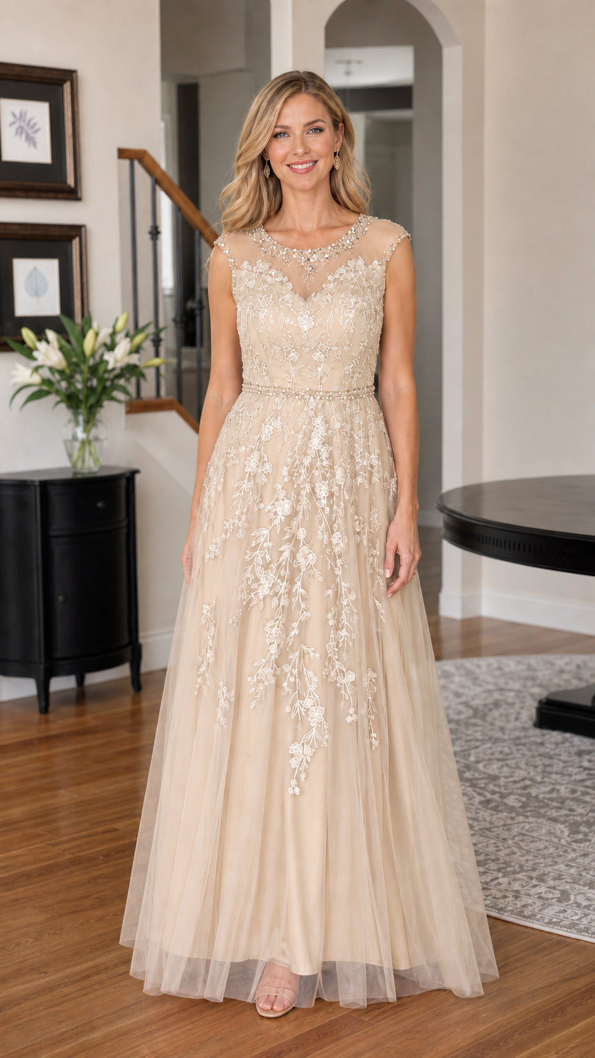 Woman wearing champagne embroidered tulle evening gown