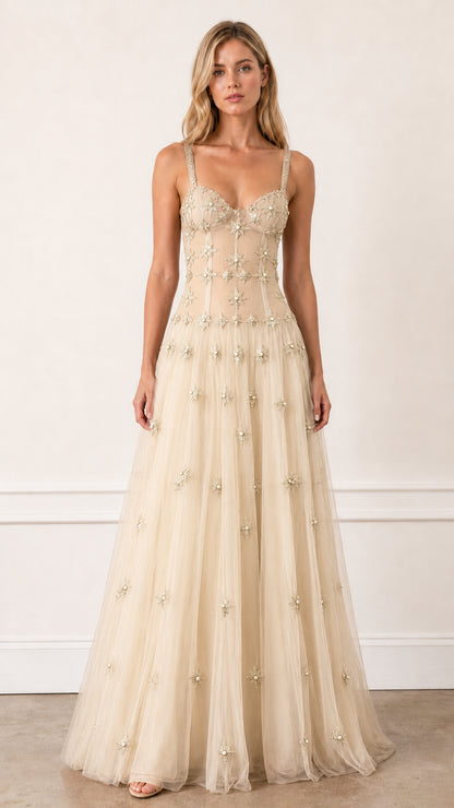 Front view of Champagne embroidered starburst tulle evening gown