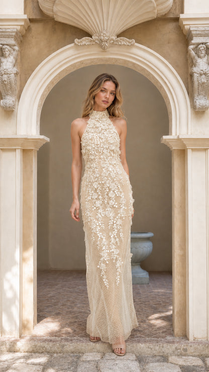 Front view of champagne embroidered halter maxi dress