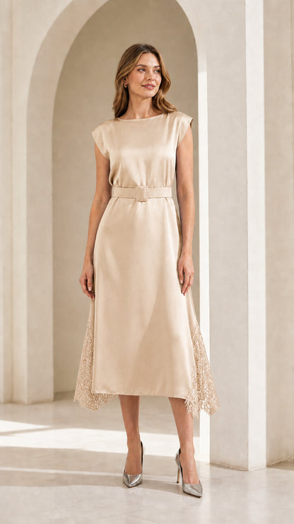 Model wearing champagne satin midi dress