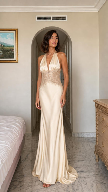 Front view of champagne satin lace halter maxi dress