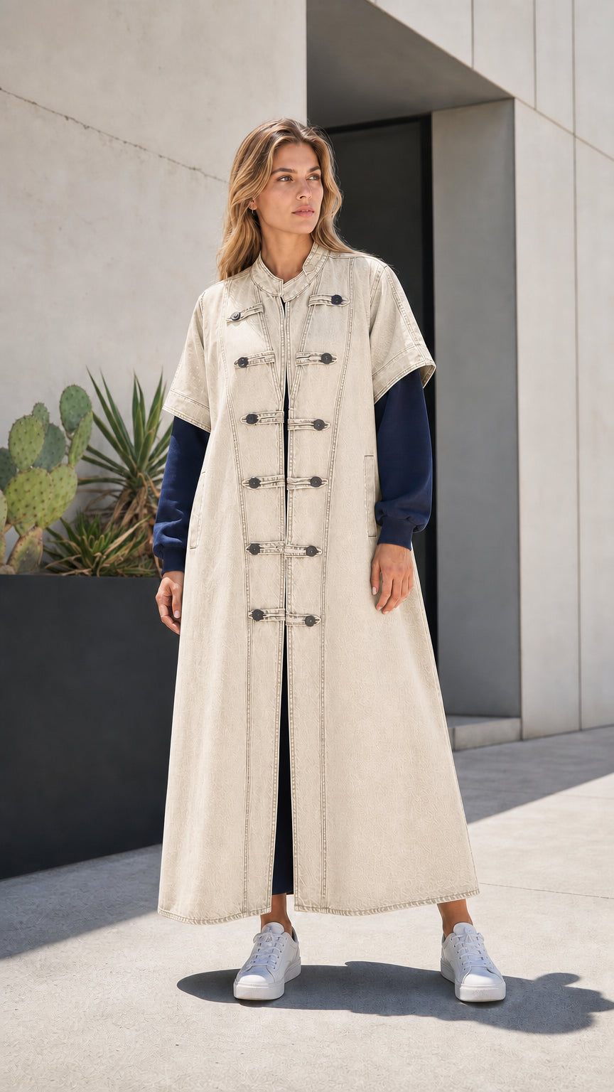 Full front view of cream off-white denim maxi duster vest coat