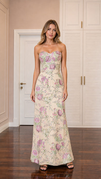 Front view of model wearing champagne beige sequin embroidered strapless formal dress