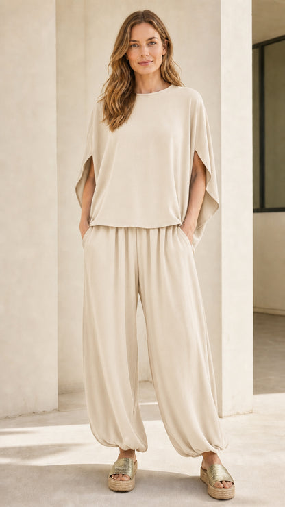 Woman wearing beige matching two-piece lounge set