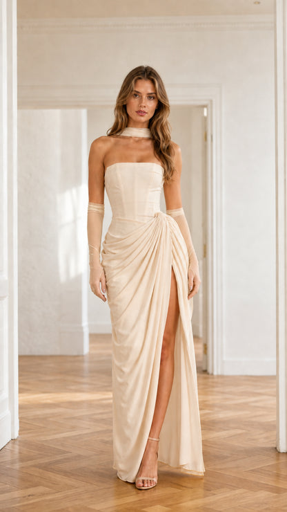 Front view of ivory strapless ruched maxi dress with high side slit