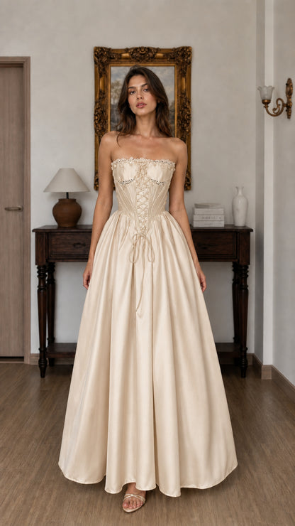 Front view of beige corset ball gown maxi dress