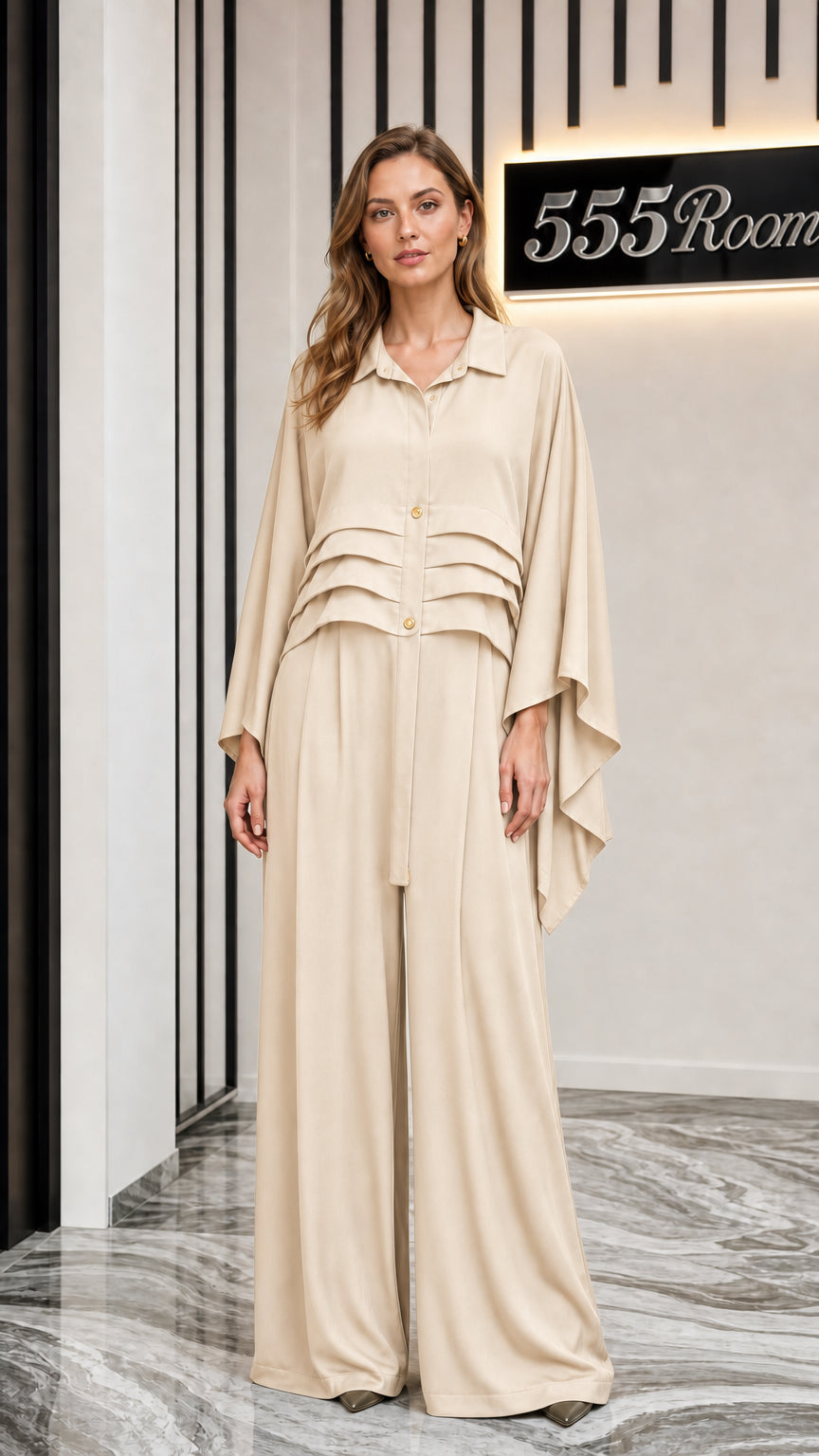 Front view of model wearing beige two-piece set