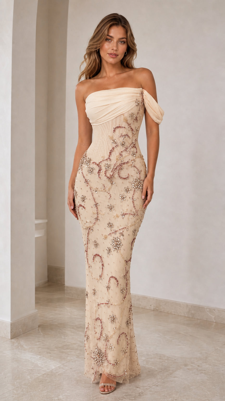 Front view of champagne beaded evening gown