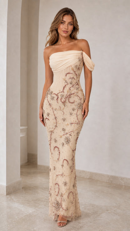 Front view of champagne beaded evening gown