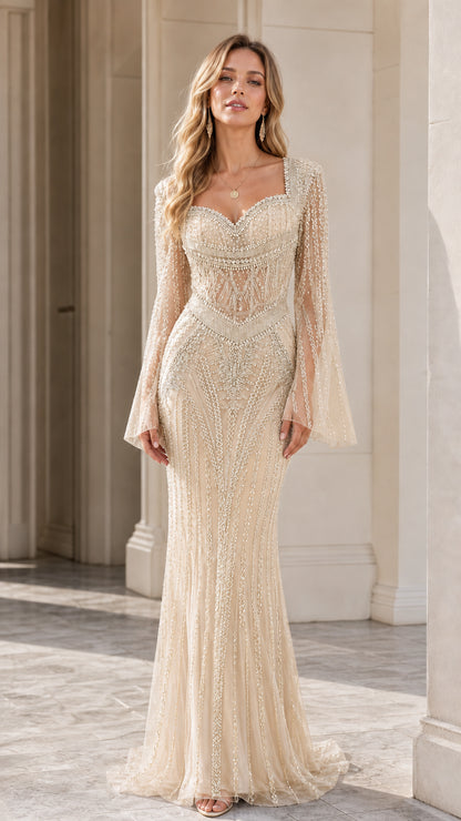 Front full-length view of model in Champagne gold beaded evening gown with bell sleeves
