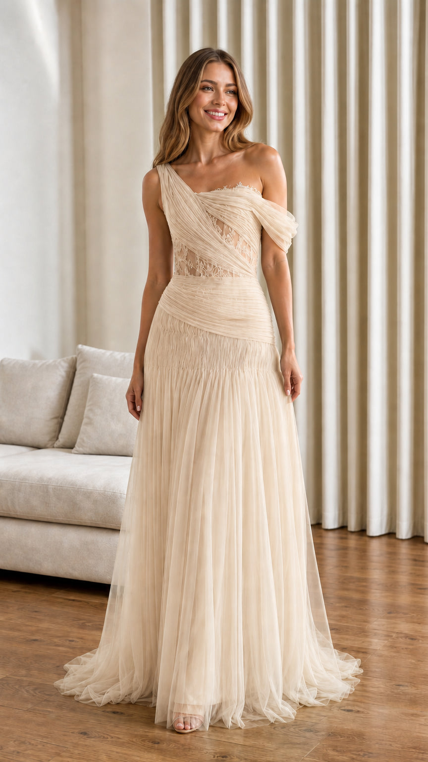 Front view of champagne one-shoulder pleated tulle evening gown