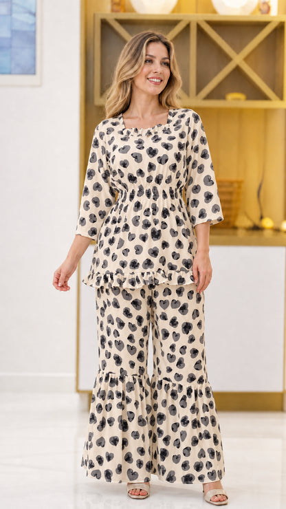 Beige cream floral print matching two-piece pant set on model
