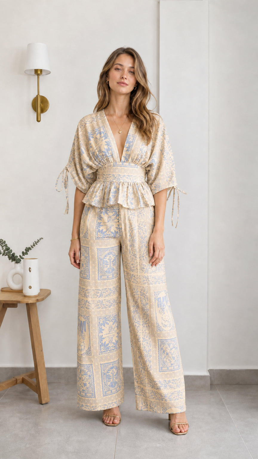 Model wearing beige printed two-piece set