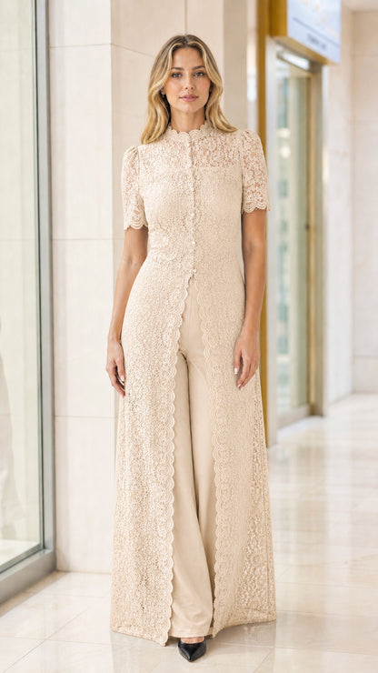 Model wearing champagne beige lace tunic with matching wide-leg pants